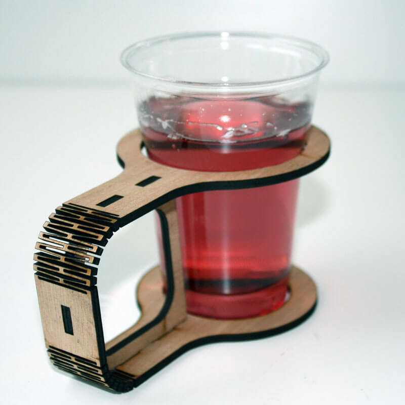 Laser cutting of cup holders in plywood with a CO2 laser