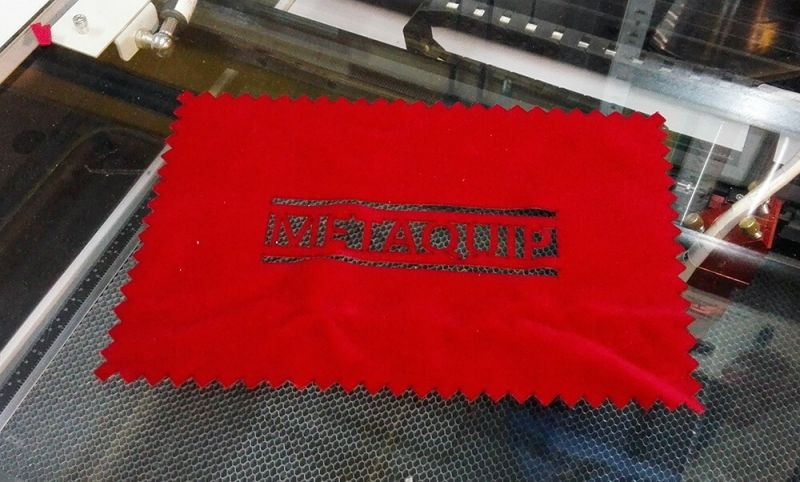 Laser cutting of textile and fabric with a CO2 laser