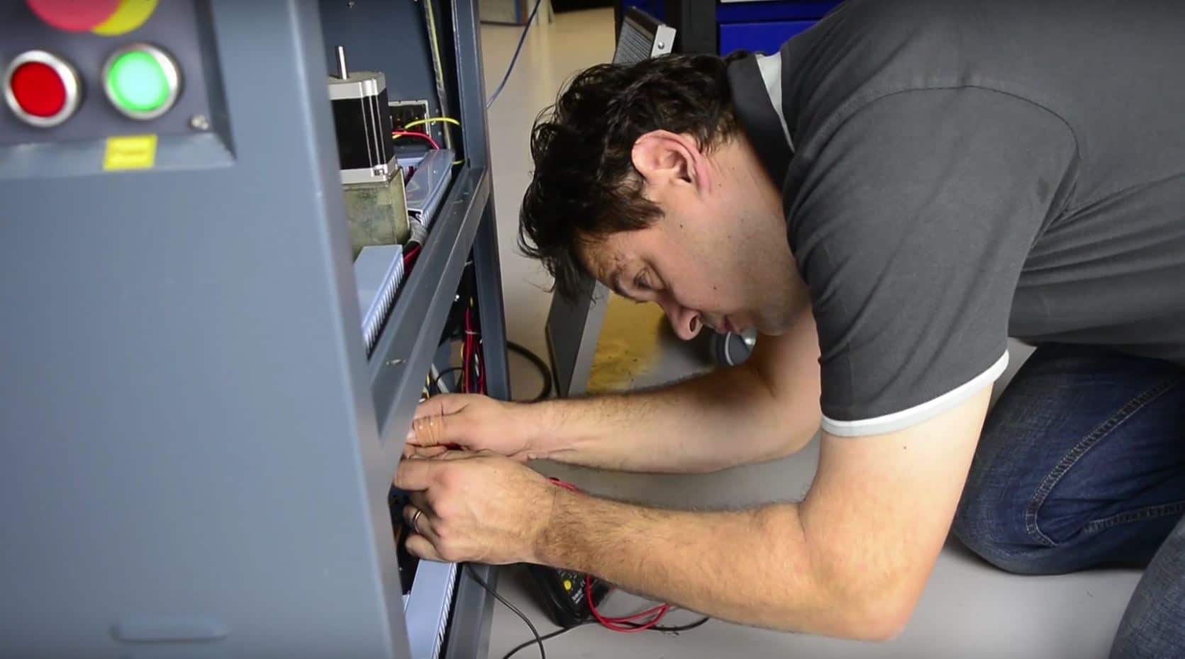 Laser machine maintenance by MetaQuip service technician