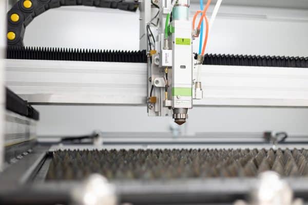 Laser head close-up MetaQuip FC1390 metal laser cutter