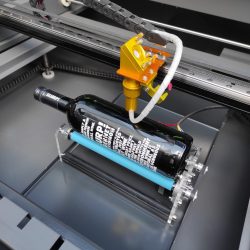 Laser engraving of round, cylindrical and conical objects - rotation module laser machine